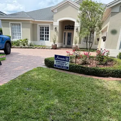 Aquapals Windows Cleaned yard sign at a Central Florida home