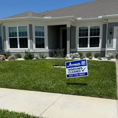 Aquapals Windows Cleaned yard sign at a Central Florida home